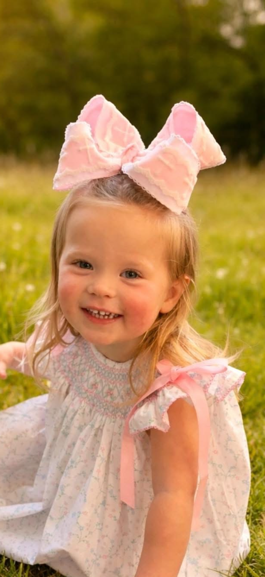 Cross lace bow