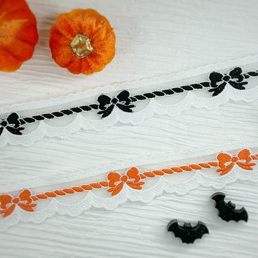 Black or orange lace bows